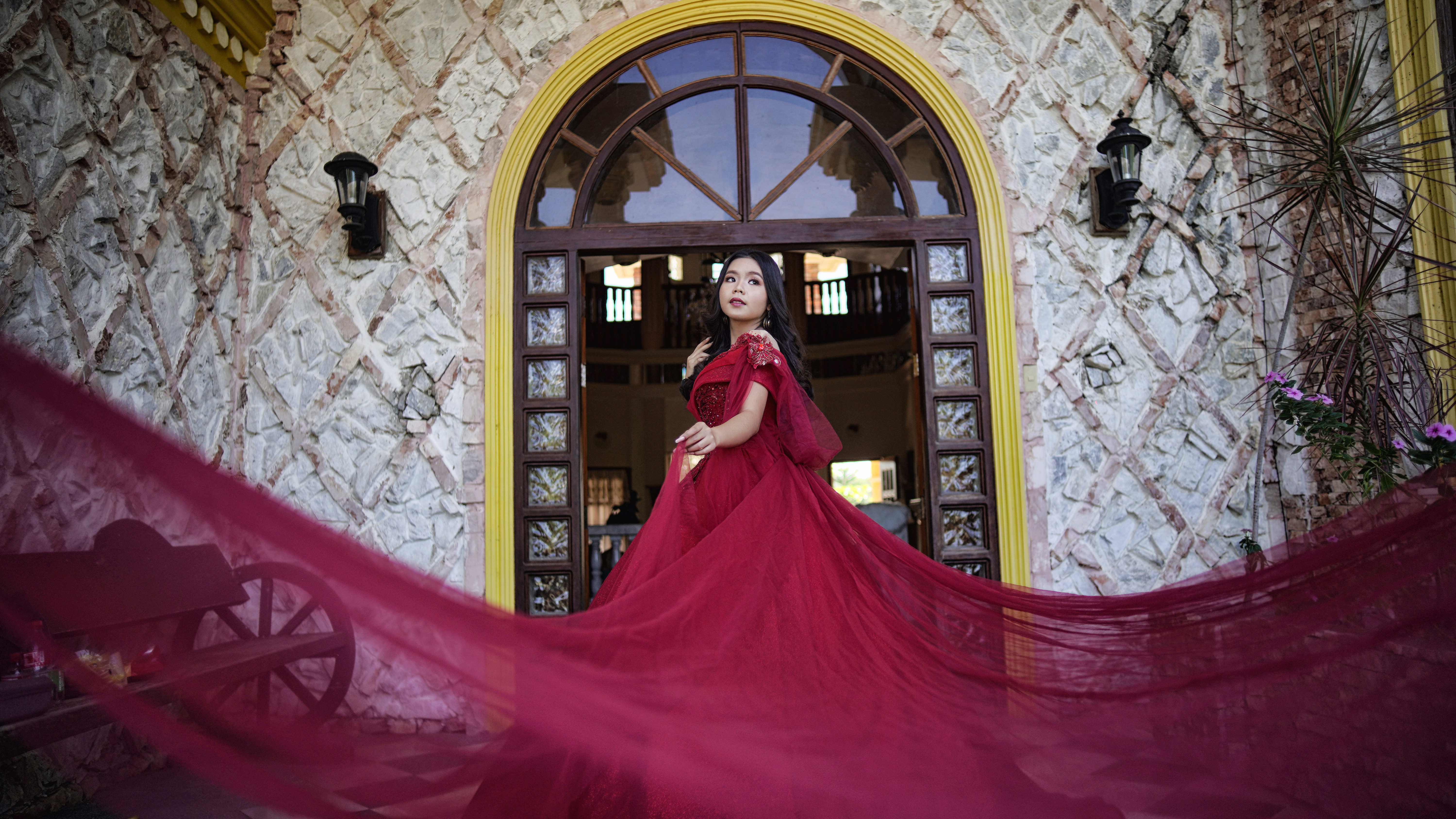 Debutante in red gown